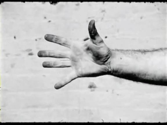 still: Richard Serra - Hand catching lead (1968)