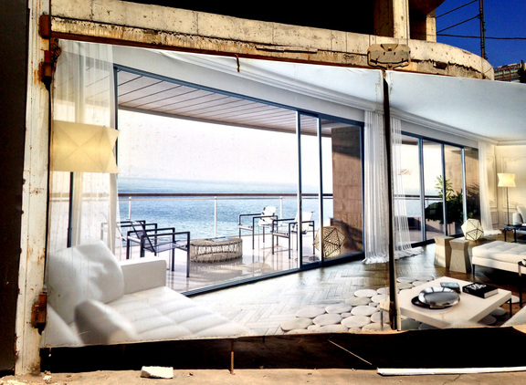 Helene Kazan. 2015. Photograph taken of life-size architectural visualisation visible on hoarding which wraps construction site in Beirut, Lebanon.